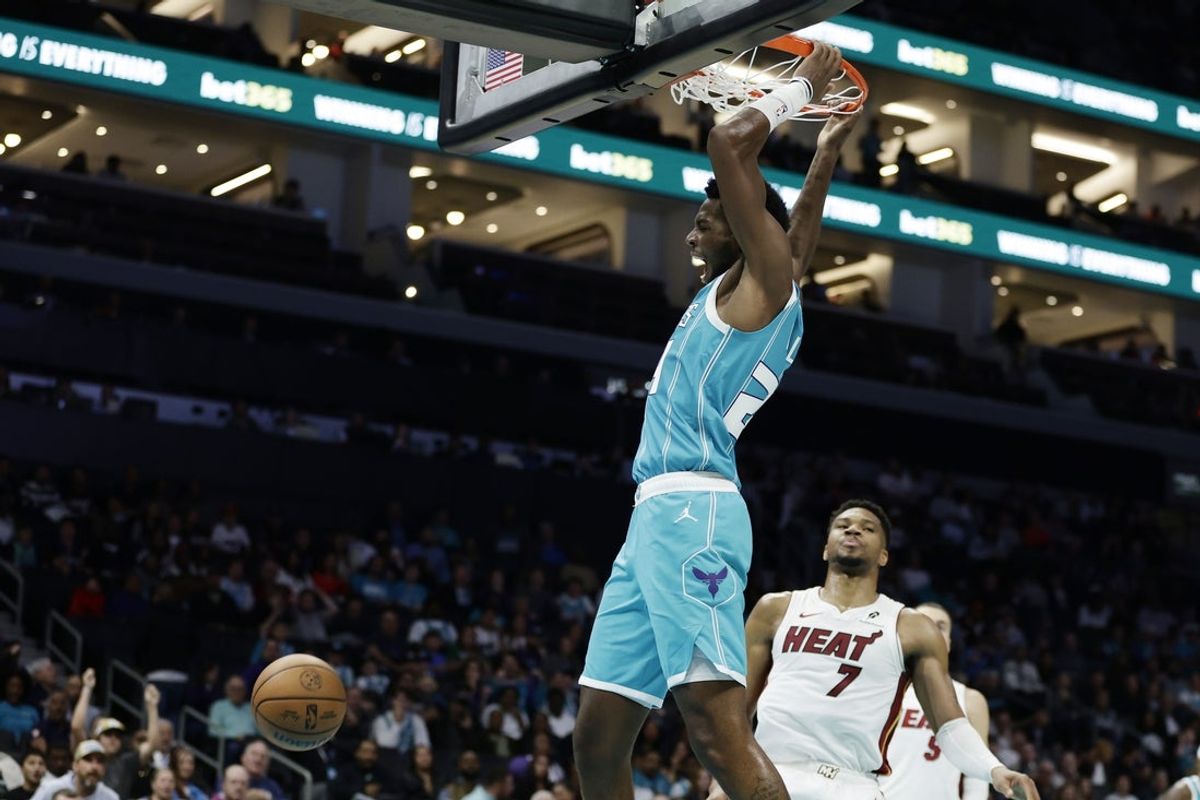 Oct 24, 2026; Charlotte, North Carolina, USA;  Charlotte Hornets forward Brandon Miller (24) reacts after a slam dunk during the second quarter against the Miami Heat at Spectrum Center.  Mandatory Credit: Brian Westerholt-Imagn Images
