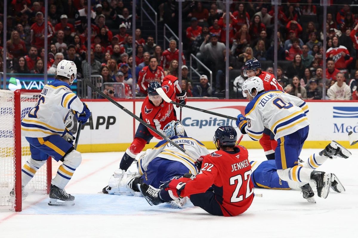 Oct 24, 2026; Washington, District of Columbia, USA; Buffalo Sabres goaltender Ukko-Pekka Luukkonen (1) makes a save on Washington Capitals right wing Ryan Leonard (9) during the third period at Capital One Arena. Mandatory Credit: Geoff Burke-Imagn Images