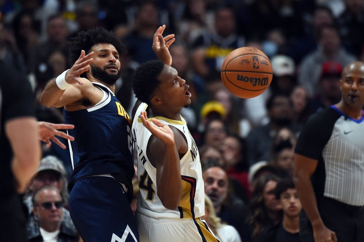 Oct 24, 2026; Denver, Colorado, USA; New Orleans Pelicans guard Bennedict Mathurin (24) has the ball knocked away by Denver Nuggets guard Jamal Murray (27) during the first half at Ball Arena. Mandatory Credit: Christopher Hanewinckel-Imagn Images