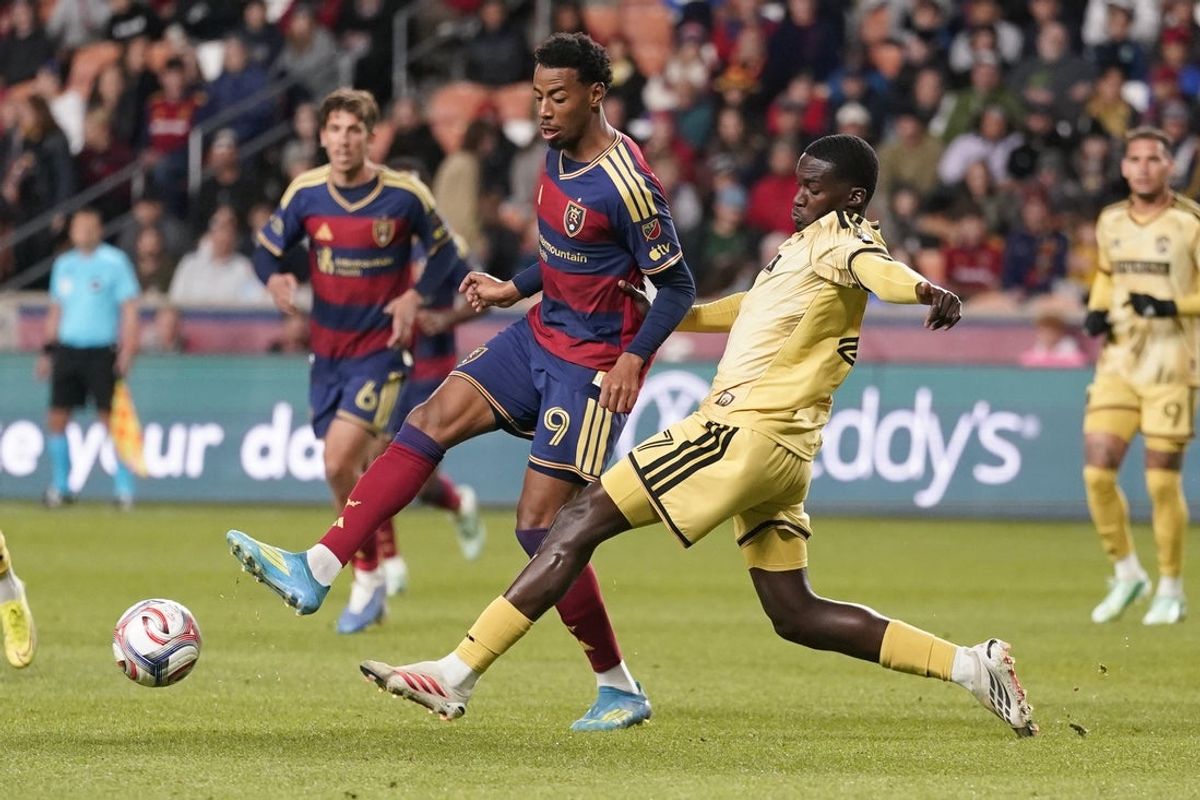 Oct 24, 2026; Sandy, Utah, USA;  St. Louis City FC midfielder Fallou Fall (27) defends Real Salt Lake Morgan forward Guilavogui (9) in the first half at America First Field.  Mandatory Credit: Aaron Baker-Imagn Images