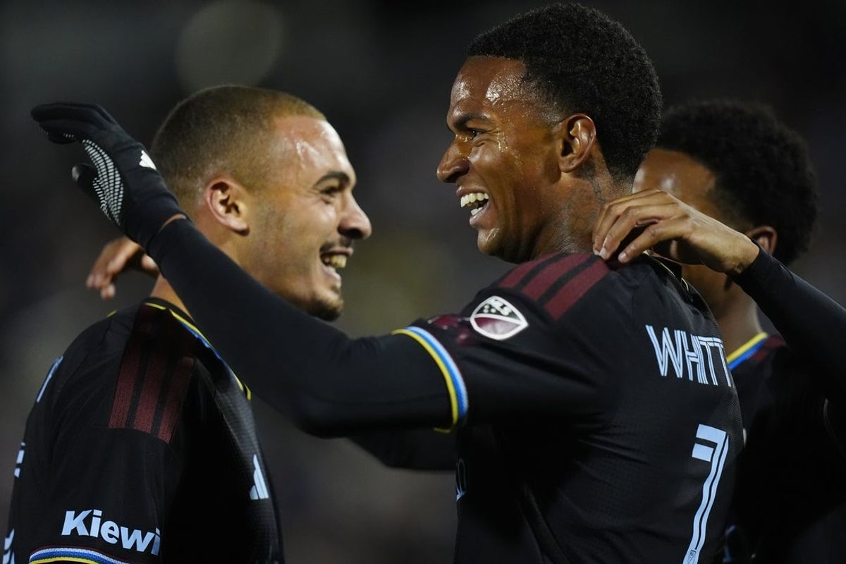 Oct 24, 2026; Commerce City, Colorado, USA;  Colorado Rapids forward Morgan Whittaker (7) celebrates his go ahead goals with teammates in the second half against the Vancouver Whitecaps FC at Dick's Sporting Goods Park.  Mandatory Credit: Ron Chenoy-Imagn Images