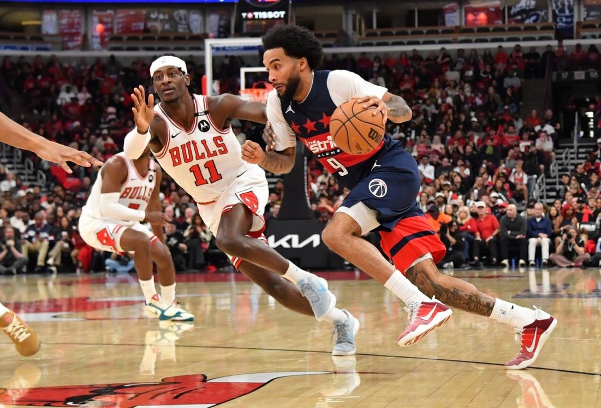 Washington Wizards forward Justin Champagnie (9) drives against Chicago Bulls forward Leonard Miller (11) during the second half at United Center.