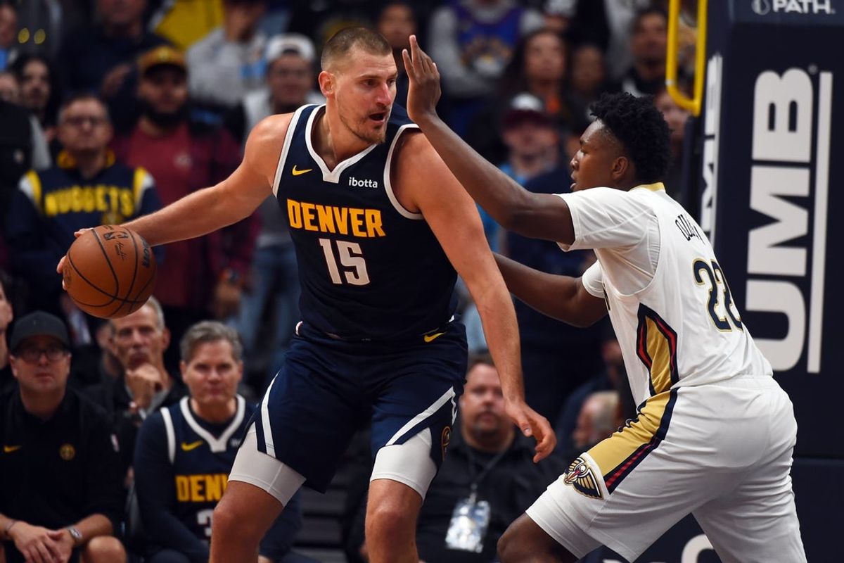 Oct 24, 2026; Denver, Colorado, USA; Denver Nuggets center Nikola Jokic (15) works in the post against New Orleans Pelicans forward Herbert Jones (2) during the second half at Ball Arena. Mandatory Credit: Christopher Hanewinckel-Imagn Images