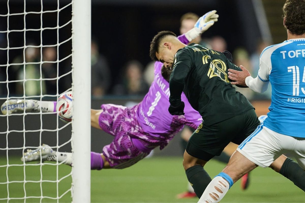 Oct 24, 2026; Portland, Oregon, USA; Portland Timbers forward Alexander Aravena (28) scores the game winning goal during the second half against Charlotte FC goalkeeper Kristijan Kahlina (1) at Providence Park. Mandatory Credit: Troy Wayrynen-Imagn Images