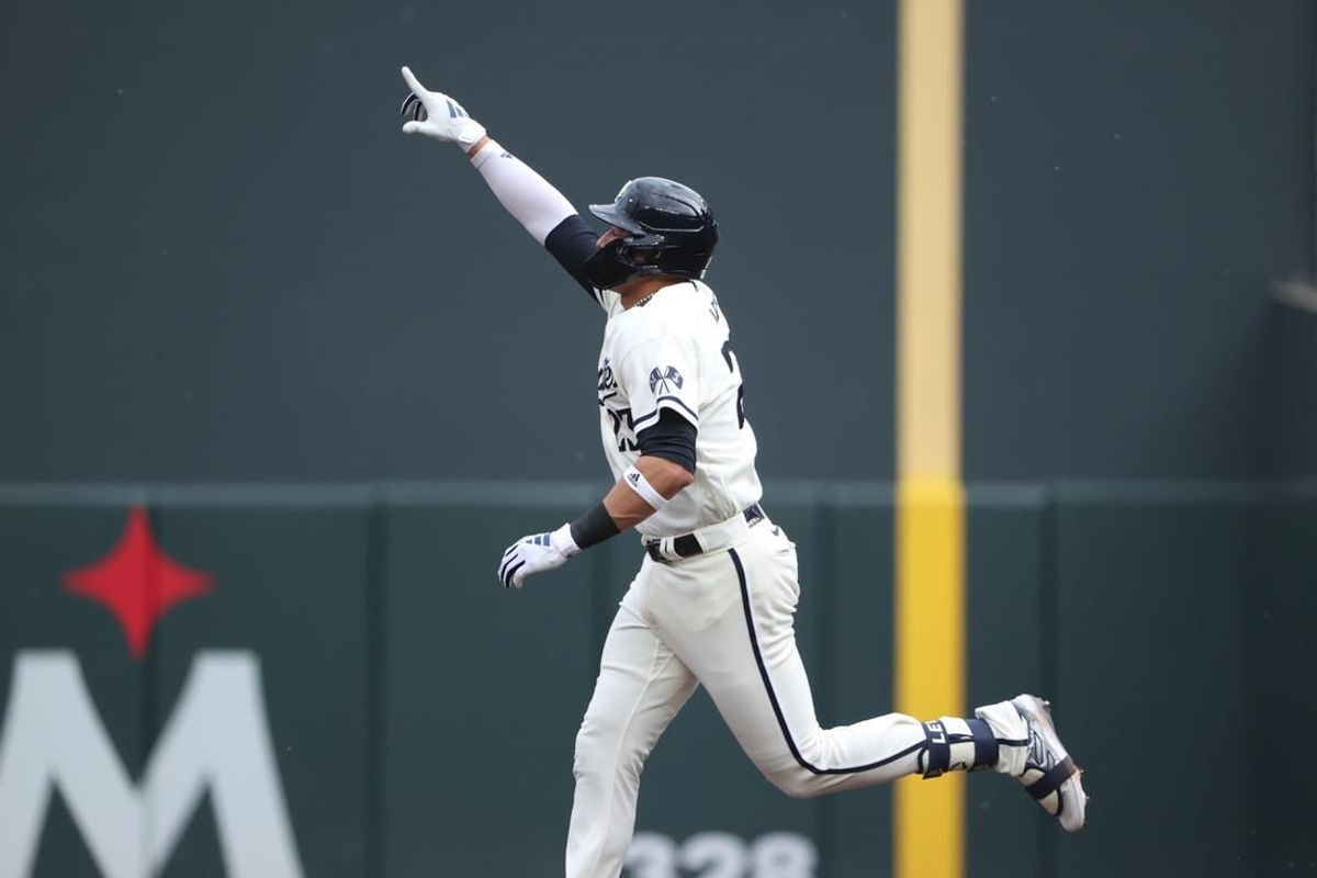Oct 3, 2023; Minneapolis, Minnesota, USA; Minnesota Twins short stop Royce Lewis (23) celebrates after hitting a home run in the third inning against the Toronto Blue Jays during game one of the Wildcard series for the 2023 MLB playoffs at Target Field.