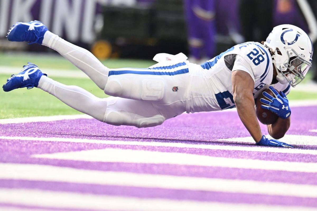 Oct 25, 2026; Minneapolis, Minnesota, USA;  Indianapolis Colts running back Jonathan Taylor (28) rushes for a touchdown against the Minnesota Vikings in the first half at U.S. Bank Stadium.  Mandatory Credit: Jeffrey Becker-Imagn Images
