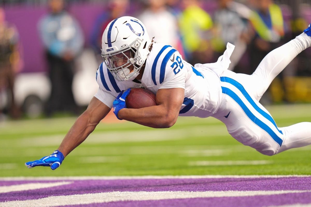 Oct 25, 2026; Minneapolis, Minnesota, USA;  Indianapolis Colts running back Jonathan Taylor (28) dives for a touchdown against the Minnesota Vikings in the first half at U.S. Bank Stadium.  Mandatory Credit: Brad Rempel-Imagn Images