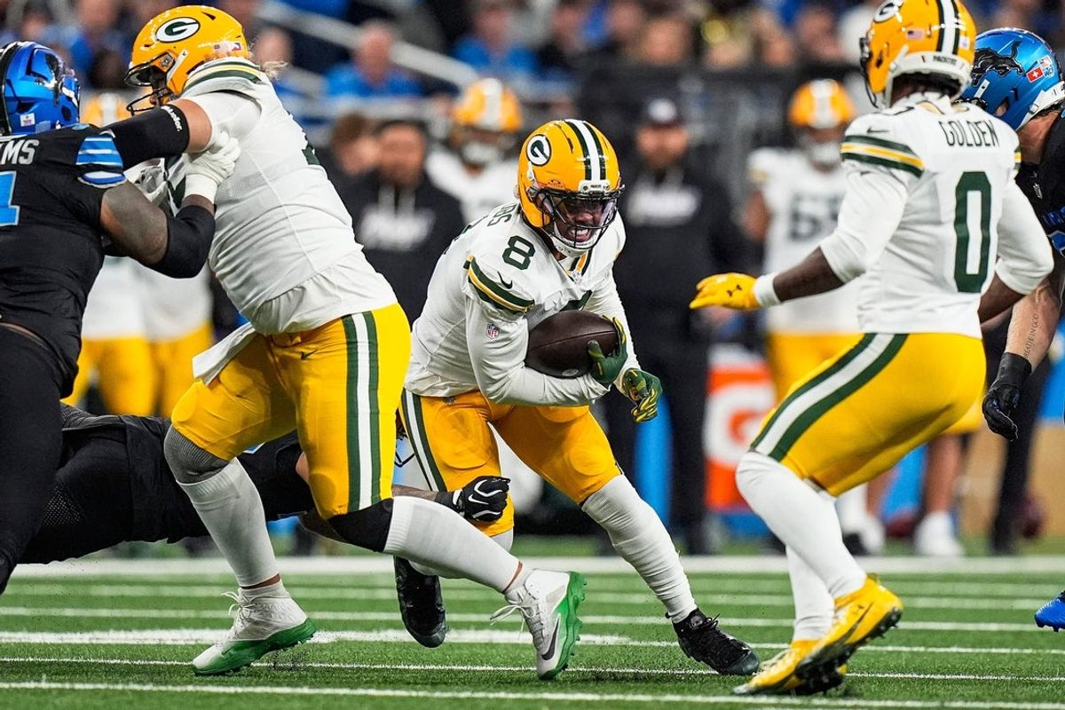Green Bay Packers running back Josh Jacobs (8) runs against Detroit Lions during the first half at Ford Field in Detroit on Sunday, Oct. 25, 2026.