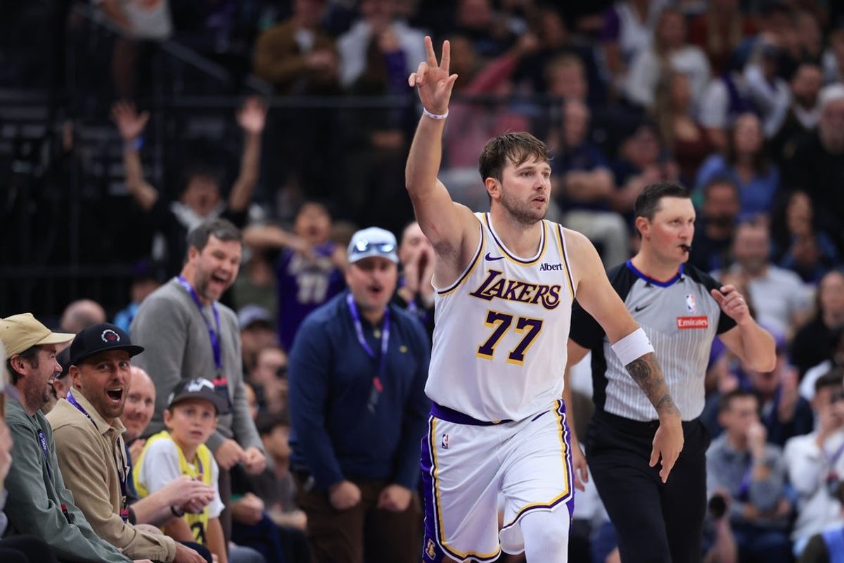 Oct 25, 2026; Salt Lake City, Utah, USA;  Los Angeles Lakers guard Luka Doncic (77) reacts after making a shot against the Utah Jazz during the second half at Delta Center.  Mandatory Credit: Rob Gray-Imagn Images