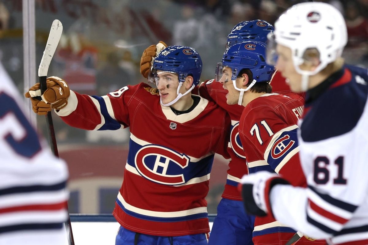 Oct 25, 2026; Winnipeg, Manitoba, CAN;  Montreal Canadiens defenseman Lane Hutson (48) celebrates a goal against the Winnipeg Jets in the second period during the 2026 Heritage Classic ice hockey game at Princess Auto Stadium.  Mandatory Credit: James Carey Lauder-Imagn Images