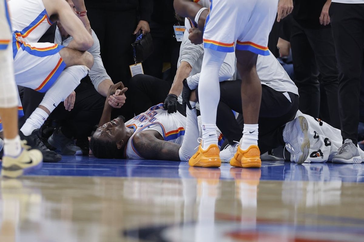 Oct 25, 2026; Oklahoma City, Oklahoma, USA; Oklahoma City Thunder guard Jalen Williams (8) lays on the floor after getting injured on a play against the Los Angeles Clippers during the second half at Paycom Center. Mandatory Credit: Alonzo Adams-Imagn Images