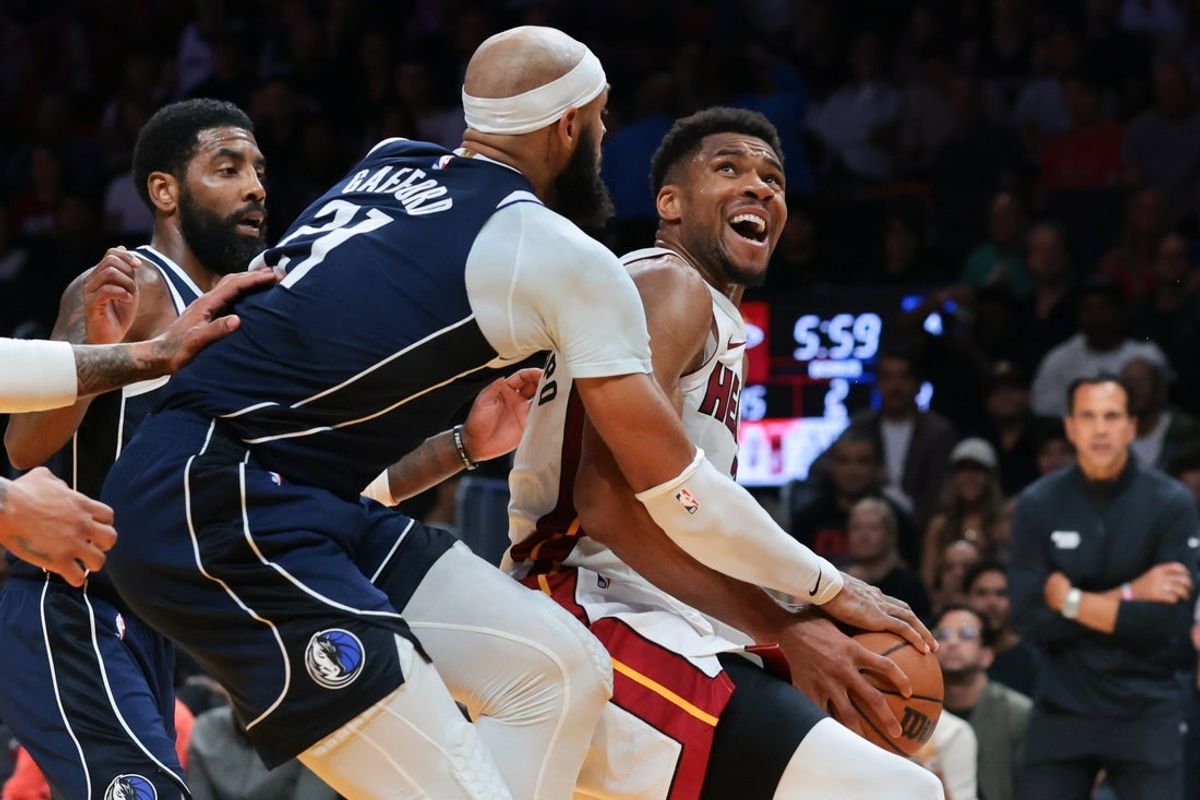 Oct 26, 2026; Miami, Florida, USA; Miami Heat forward Giannis Antetokounmpo (7) is fouled by Dallas Mavericks forward Daniel Gafford (21) during the second quarter at Kaseya Center. Mandatory Credit: Sam Navarro-Imagn Images