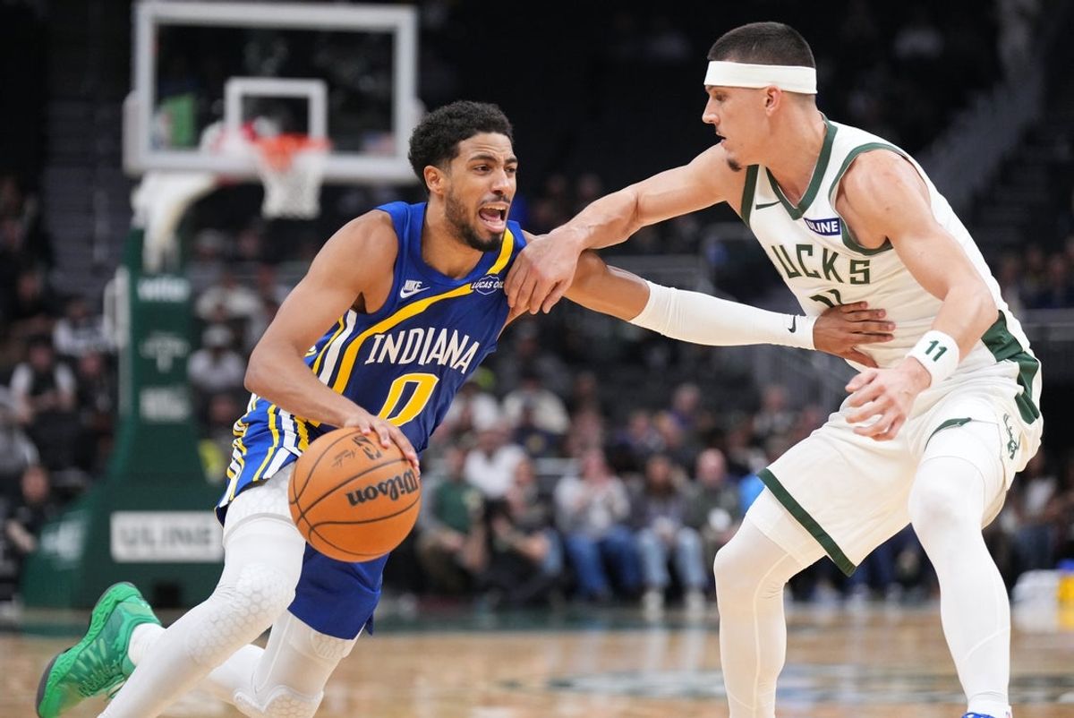 Oct 26, 2026; Milwaukee, Wisconsin, USA;  Indiana Pacers guard Tyrese Haliburton (0) drives against  Milwaukee Bucks guard Tyler Herro (11) in the first half at Fiserv Forum.  Mandatory Credit: Michael McLoone-Imagn Images