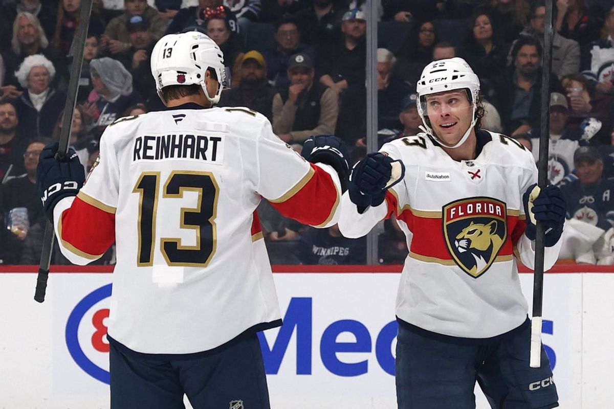 Oct 27, 2026; Winnipeg, Manitoba, CAN;  Florida Panthers center Carter Verhaeghe (23) celebrates a goal against the Winnipeg Jets with Florida Panthers center Sam Reinhart (13) in the first period at Canada Life Centre.  Mandatory Credit: James Carey Lauder-Imagn Images