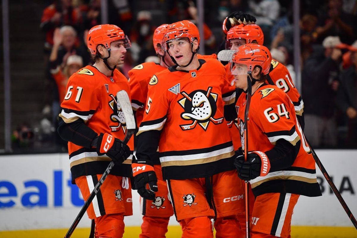 Oct 27, 2026; Anaheim, California, USA; Anaheim Ducks right wing Beckett Sennecke (45) celebrates his goal scored against the Vancouver Canucks with left wing Cutter Gauthier (61) and center Mikael Granlund (64) during the second period at Honda Center. Mandatory Credit: Gary A. Vasquez-Imagn Images