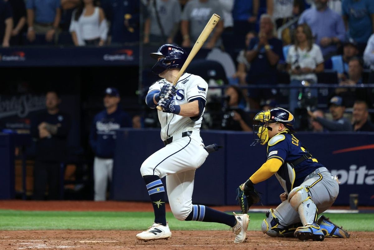 Oct 27, 2026; St. Petersburg, Florida, USA;  Tampa Bay Rays second baseman Ben Williamson (15) hits a walk-off single against the Milwaukee Brewers during the twelfth inning in game four of the 2026 World Series at Tropicana Field.  Mandatory Credit: Kim Klement Neitzel-Imagn Images