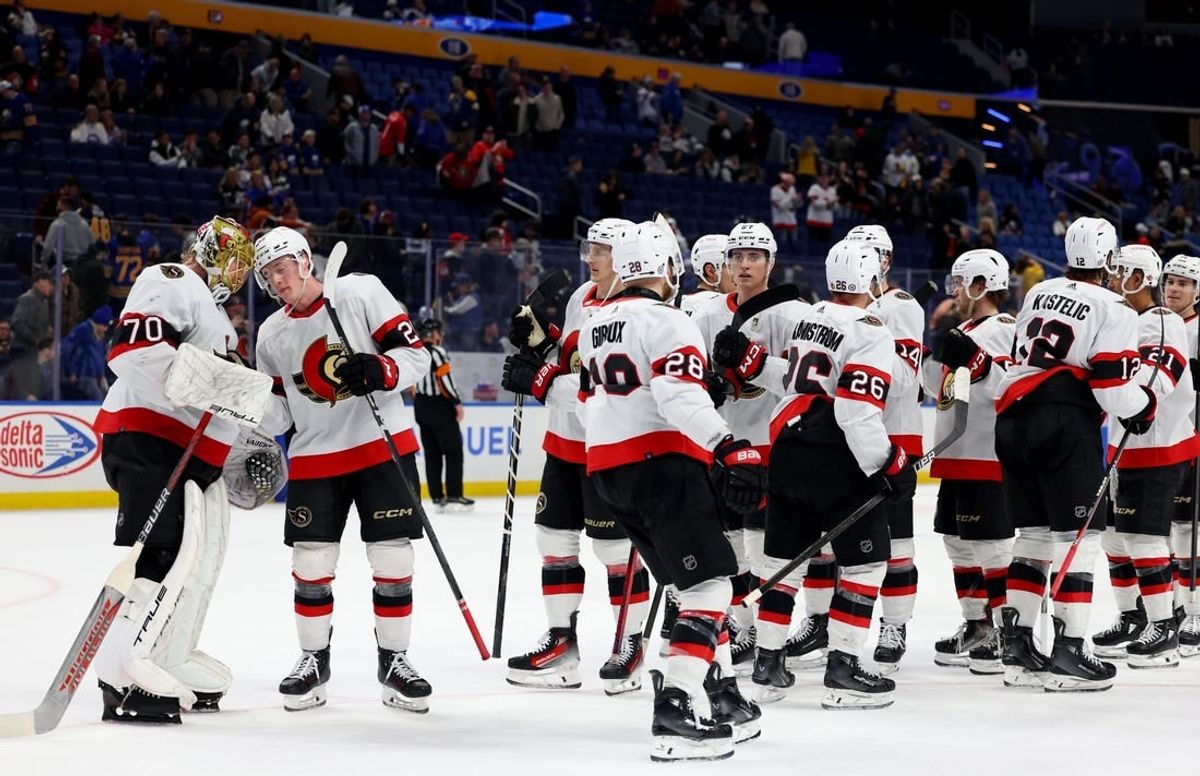 Mar 27, 2024; Buffalo, New York, USA;  The Ottawa Senators celebrate a win over the Buffalo Sabres at KeyBank Center.