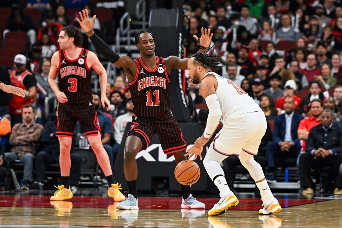 Oct 28, 2026; Chicago, Illinois, USA;  New York Knicks guard Jalen Brunson (11) dribbles against Chicago Bulls forward Leonard Miller (11) during the first half at United Center.  Mandatory Credit: Matt Marton-Imagn Images
