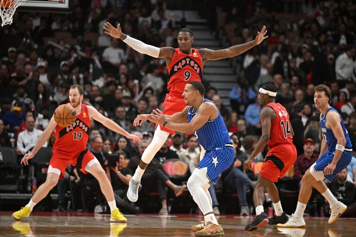 Oct 28, 2026; Toronto, Ontario, CAN;  Toronto Raptors forward RJ Barrett (9) jumps to defend his basket as Orlando Magic forward Desmond Bane (3) passes the ball in the second half at Scotiabank Arena.  Mandatory Credit: Dan Hamilton-Imagn Images