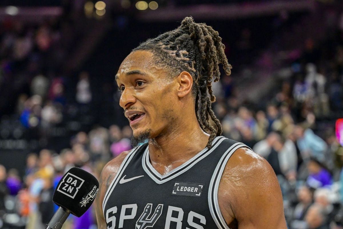 Oct 28, 2026; Salt Lake City, Utah, USA;  San Antonio Spurs guard/forward Devin Vassell (24) gives a postgame interview after they defeat the Utah Jazz at Delta Center.  Mandatory Credit: Peter Creveling-Imagn Images