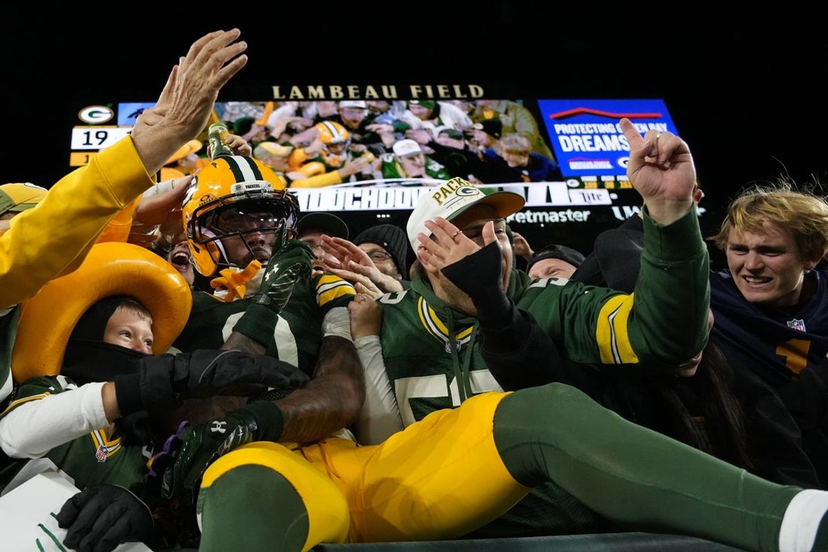 Oct 29, 2026; Green Bay, Wisconsin, USA;  Green Bay Packers wide receiver Matthew Golden (0) reacts after making a touchdown catch against the Carolina Panthers in the first half at Lambeau Field.  Mandatory Credit: Jeff Hanisch-Imagn Images