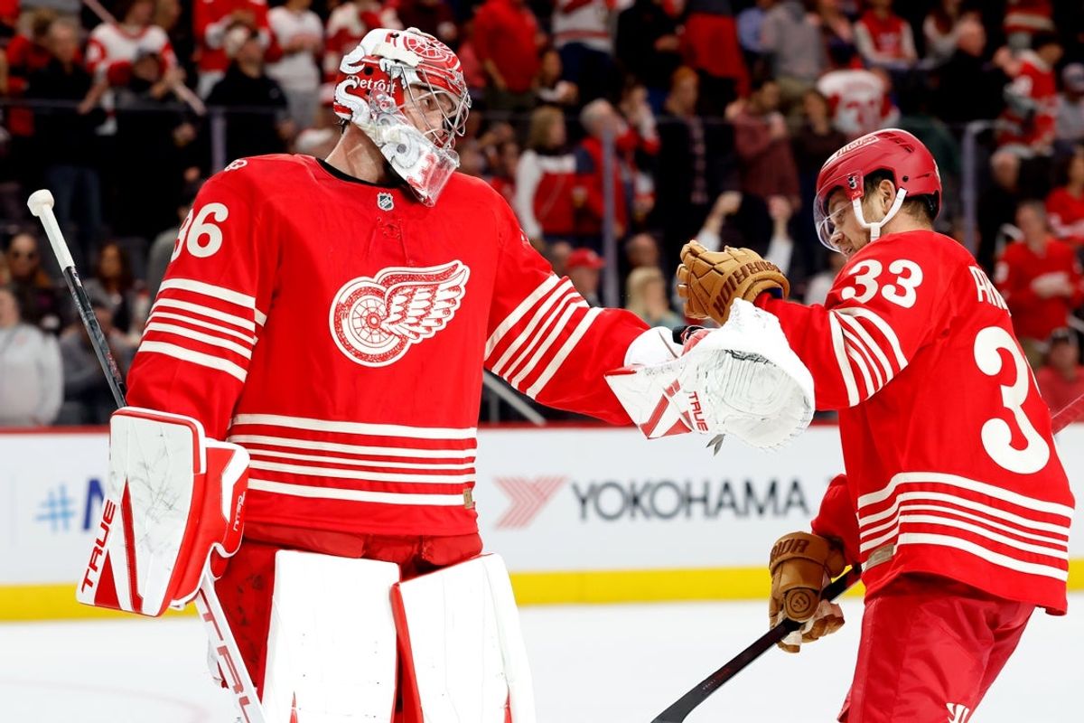 Oct 29, 2026; Detroit, Michigan, USA;  Detroit Red Wings left wing Viktor Arvidsson (33) receives congratulations from goaltender John Gibson (36) after scoring in the third period against the Chicago Blackhawks at Little Caesars Arena.  Mandatory Credit: Rick Osentoski-Imagn Images