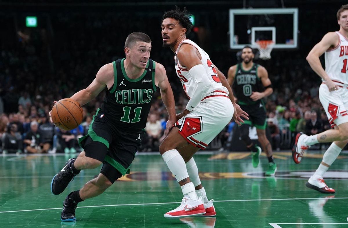 Oct 30, 2026; Boston, Massachusetts, USA; Boston Celtics guard Payton Pritchard (11) drives the ball against Chicago Bulls guard Tre Jones (30) in the first quarter at TD Garden. Mandatory Credit: David Butler II-Imagn Images
