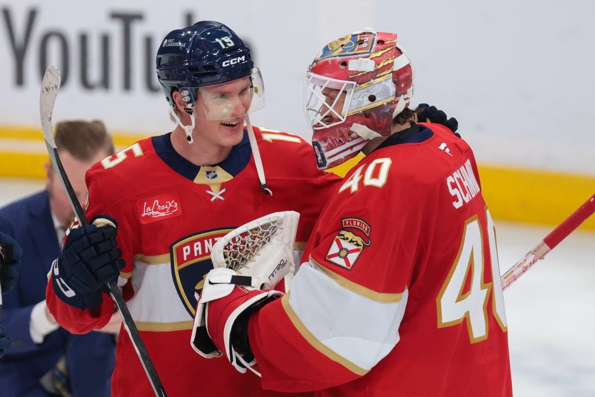 Oct 30, 2026; Sunrise, Florida, USA; Florida Panthers center Anton Lundell (15) celebrates with goaltender Akira Schmid (40) after the game against the Winnipeg Jets at Amerant Bank Arena. Mandatory Credit: Sam Navarro-Imagn Images