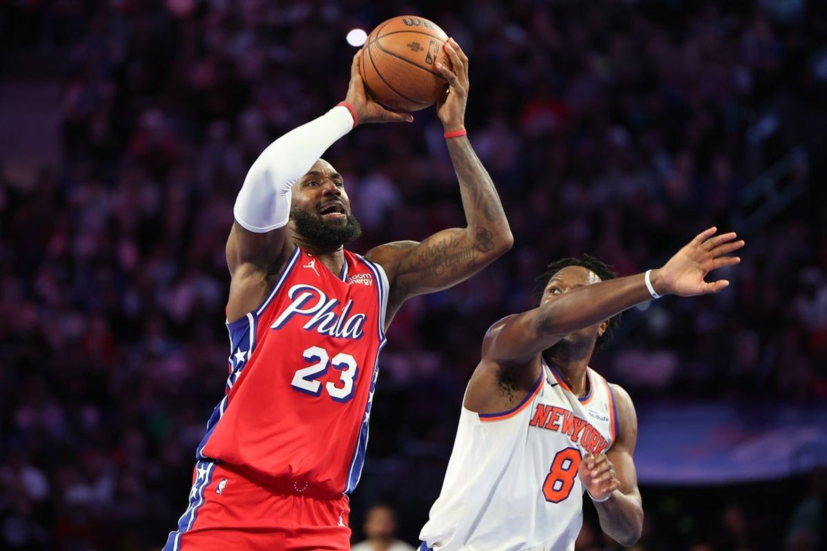 Oct 30, 2026; Philadelphia, Pennsylvania, USA; Philadelphia 76ers forward LeBron James (23) drives for a shot against New York Knicks forward Og Anunoby (8) during the fourth quarter at Xfinity Mobile Arena. Mandatory Credit: Bill Streicher-Imagn Images