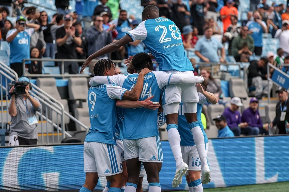 Oct 31, 2026; Charlotte, North Carolina, USA;  Charlotte FC teammates celebrate a goal scored during the first half of a game between Charlotte FC and Orlando City SC at Bank of America Stadium.  Mandatory Credit: Cory Knowlton-Imagn Images