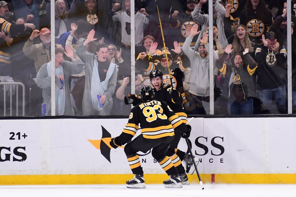 Oct 31, 2026; Boston, Massachusetts, USA;  Boston Bruins center Elias Lindholm (28) reacts with center Fraser Minten (93) after scoring the winning goal in overtime against the Chicago Blackhawks at TD Garden. Mandatory Credit: Bob DeChiara-Imagn Images