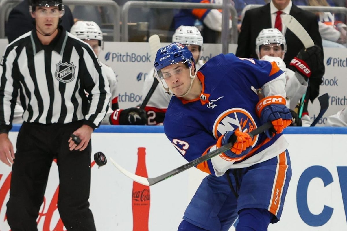 Mar 16, 2024; Elmont, New York, USA;  New York Islanders center Mathew Barzal (13) makes a pass against the Ottawa Senators during the second period at UBS Arena.