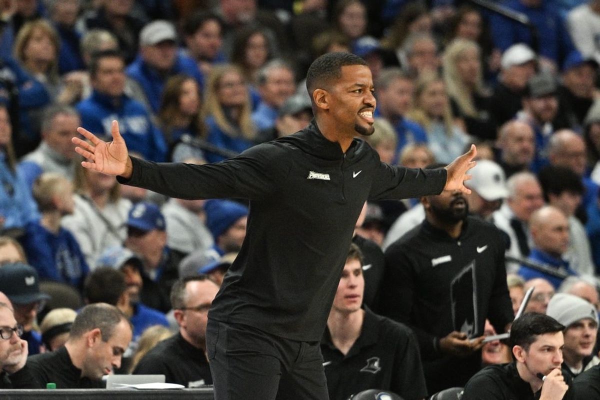 Jan 6, 2024; Omaha, Nebraska, USA; Providence Friars head coach Kim English watches action against the Creighton Bluejays in the first half at CHI Health Center Omaha.