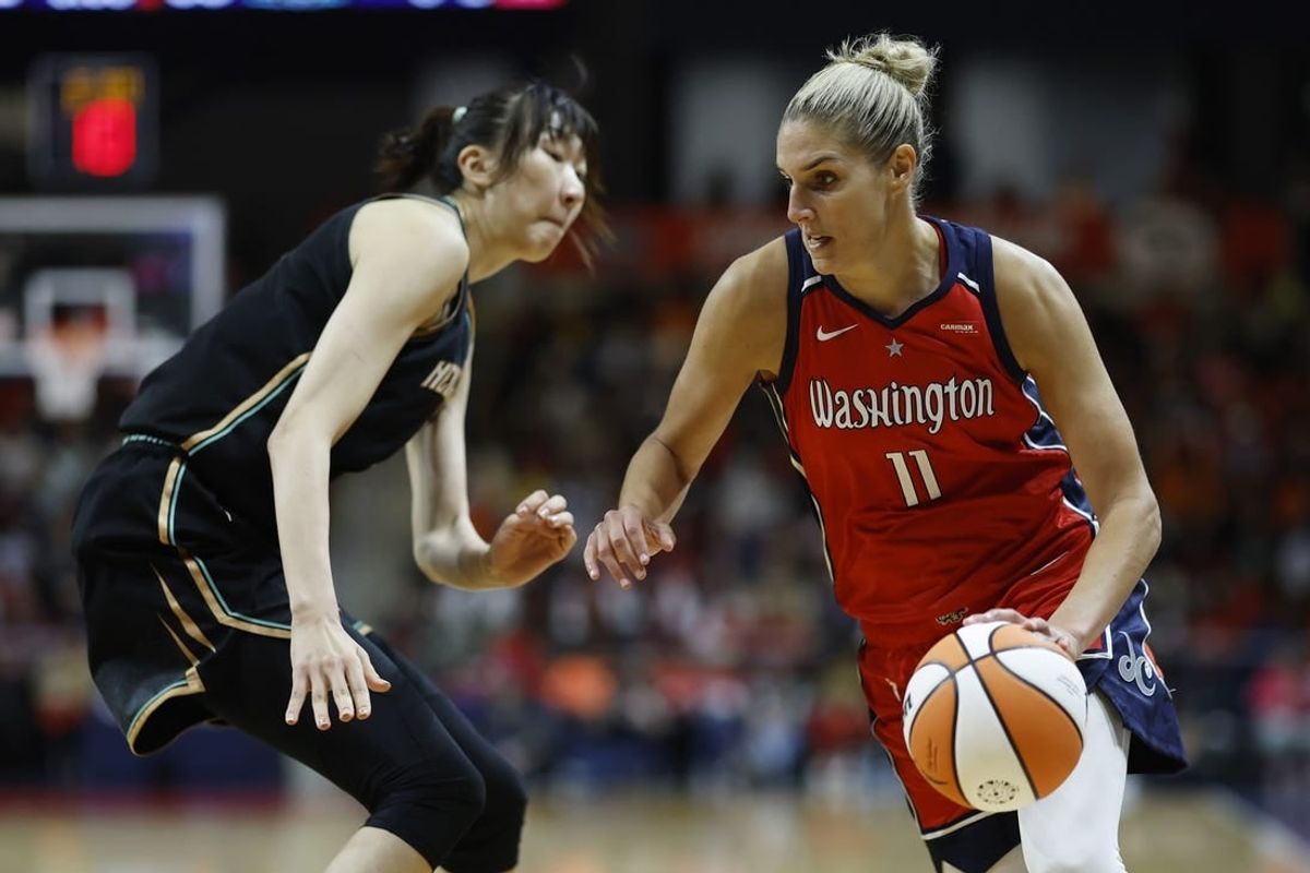 May 19, 2023; Washington, District of Columbia, USA; Washington Mystics forward Elena Delle Donne (11) drives to the basket as New York Liberty center Han Xu (21) defends in the fourth quarter at Entertainment & Sports Arena.