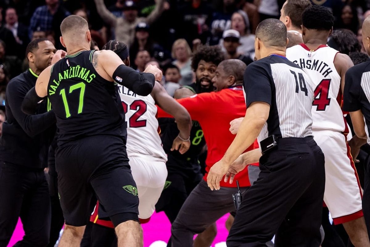 Feb 23, 2024; New Orleans, Louisiana, USA;  Miami Heat forward Jimmy Butler (22) and New Orleans Pelicans forward Naji Marshall (8) and guard Jose Alvarado (15) are ejected after a melee due to a play during the second half at Smoothie King Center.