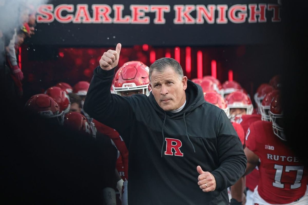 Nov 25, 2023; Piscataway, New Jersey, USA; Rutgers Scarlet Knights head coach Greg Schiano runs out to the field with his team before the game against the Maryland Terrapins at SHI Stadium.