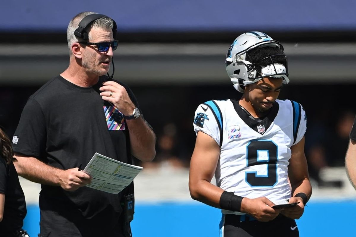 Oct 1, 2023; Charlotte, North Carolina, USA; Carolina Panthers head coach Frank Reich with quarterback Bryce Young (9) in the second quarter at Bank of America Stadium.