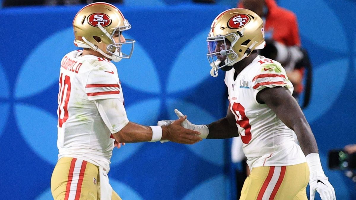 Jimmy Garoppolo (l.) and Deebo Samuel