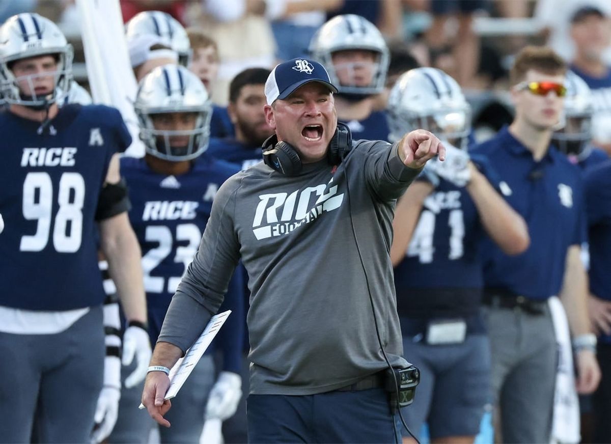 Oct 28, 2023; Houston, Texas, USA; Rice Owls head coach Mike Bloomgren argues about the time clock in the second half against the Tulane Green Wave at Rice Stadium.