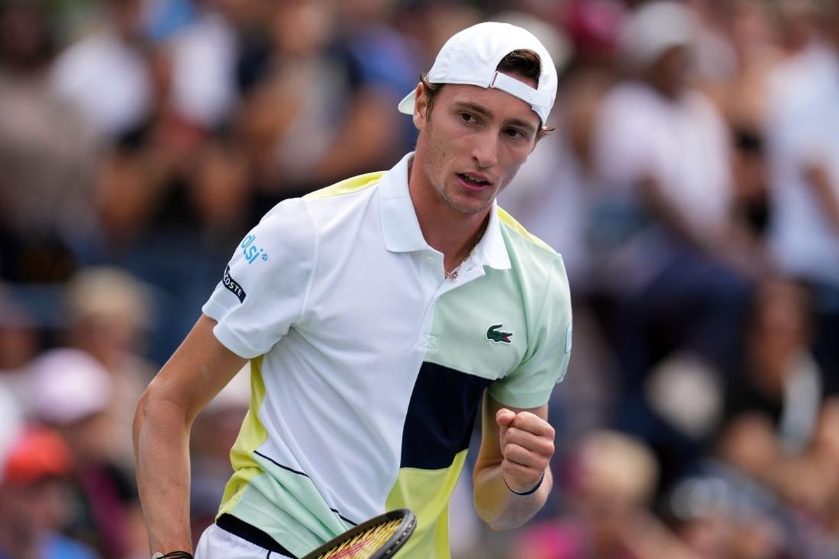 Aug 29, 2023; Flushing, NY, USA; Ugo Humbert of France wins a game in the first set against Matteo Berrettini of Italy on day two of the 2023 U.S. Open tennis tournament at USTA Billie Jean King National Tennis Center.