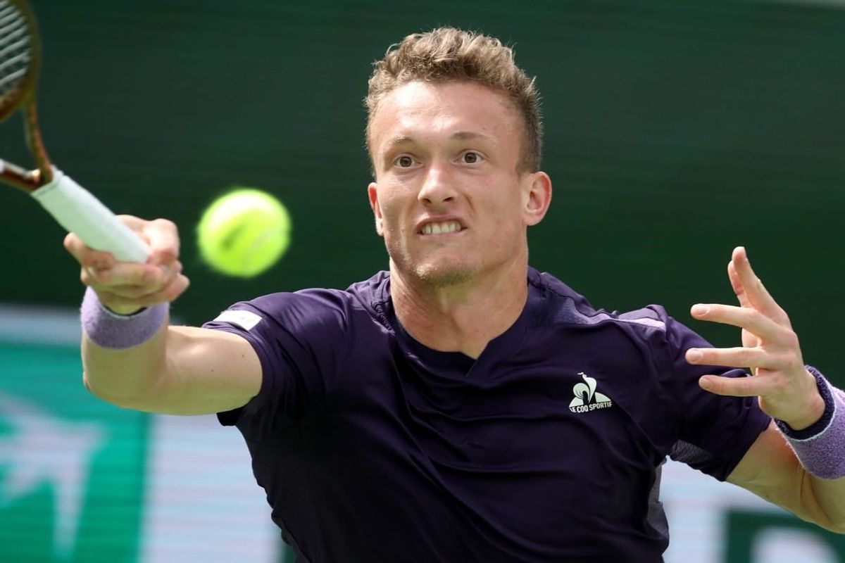 Jiri Lehecka returns to Jannik Sinner during their quarterfinal match of the BNP Paribas Open in Indian Wells, Calif., on Thurs., March 14, 2024.