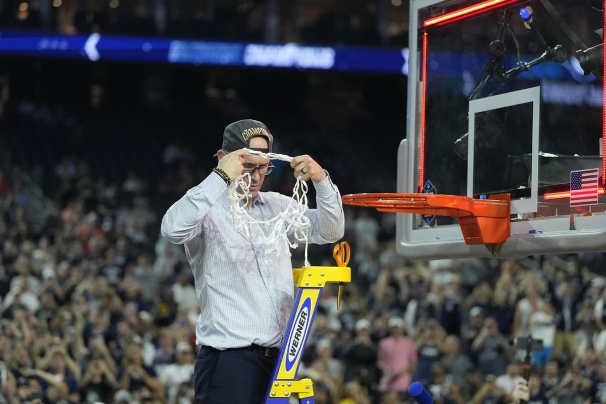Apr 3, 2023; Houston, TX, USA; Connecticut Huskies head coach Dan Hurley celebrates after cutting down the net after defeating the San Diego State Aztecs in the national championship game of the 2023 NCAA Tournament at NRG Stadium.