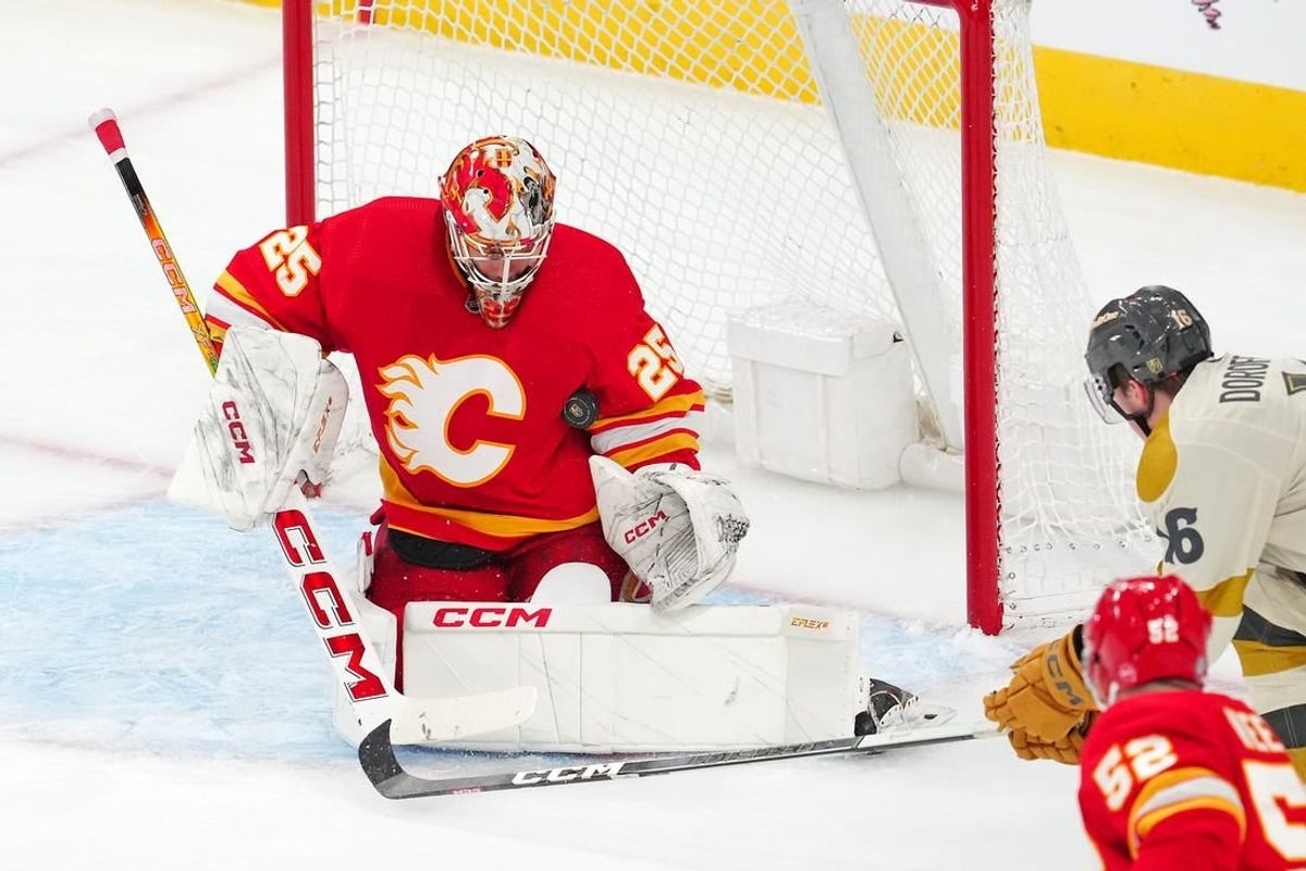 Jan 13, 2024; Las Vegas, Nevada, USA; Calgary Flames goaltender Jacob Markstrom (25) makes a save against the Vegas Golden Knights during the third period at T-Mobile Arena.