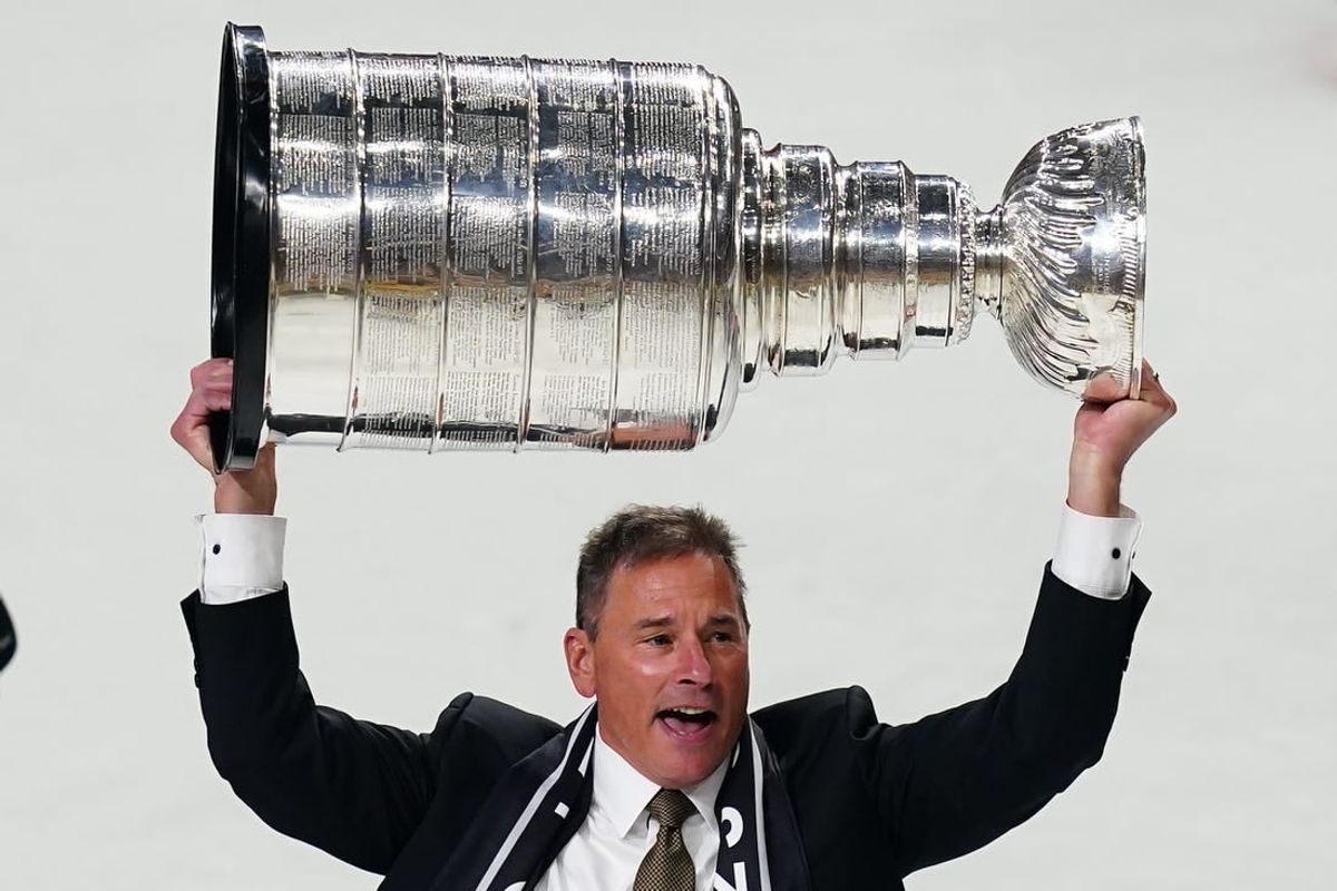 Jun 13, 2023; Las Vegas, Nevada, USA; Vegas Golden Knights head coach Bruce Cassidy hoists the Stanley Cup after defeating the Florida Panthers in game five of the 2023 Stanley Cup Final at T-Mobile Arena.