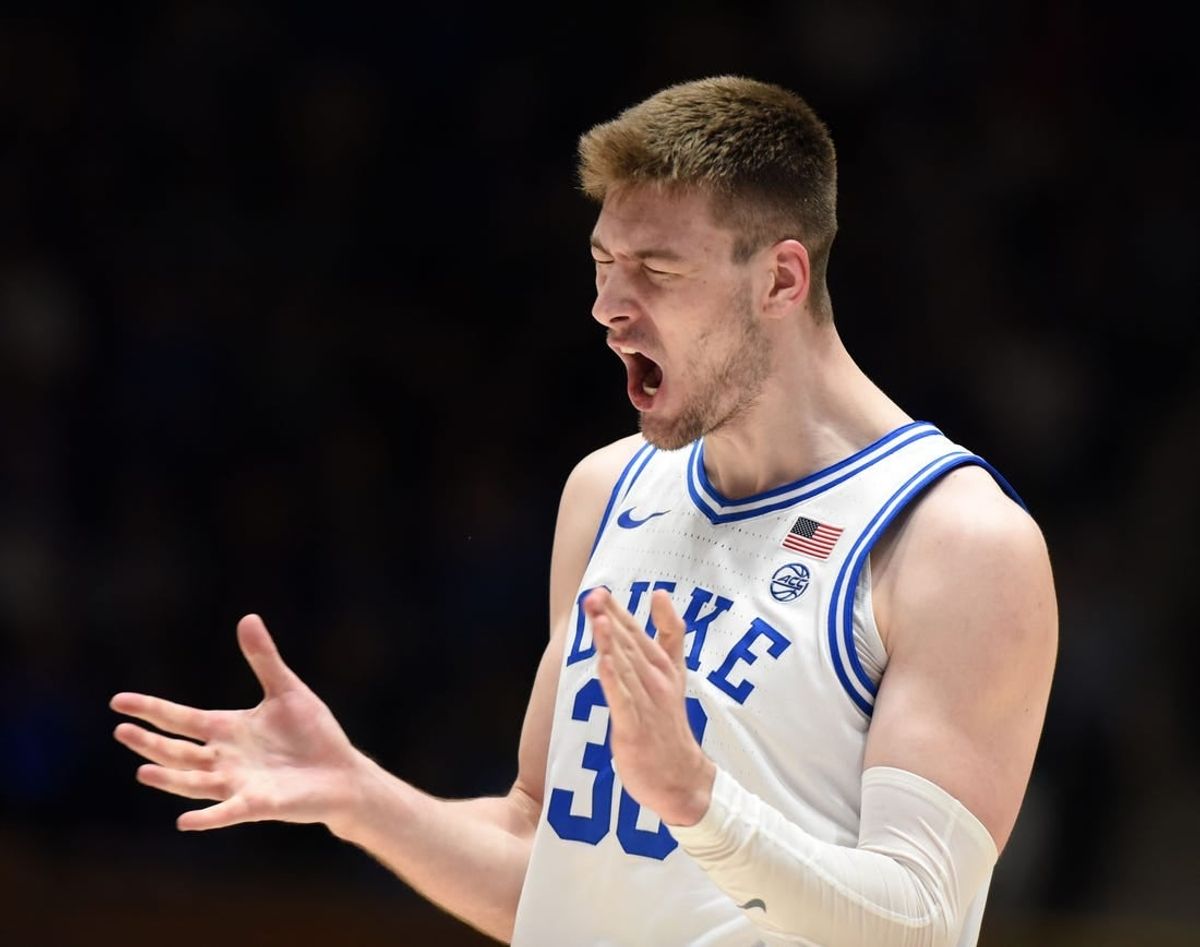 Mar 2, 2024; Durham, North Carolina, USA;  Duke Blue Devils center Kyle Filipowski (30) reacts after making a three-point shot during the first half against the Virginia Cavaliers at Cameron Indoor Stadium.