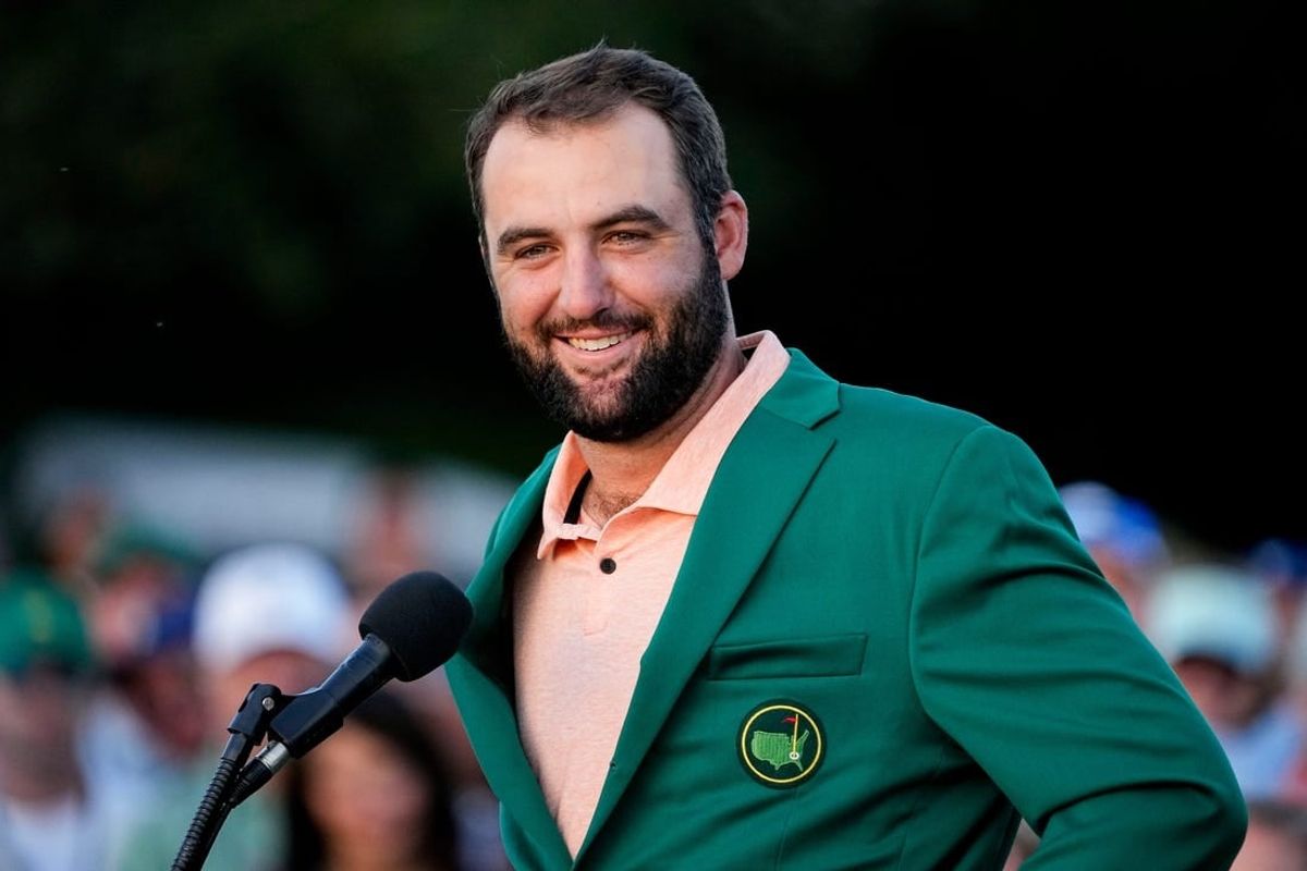 Apr 14, 2024; Augusta, Georgia, USA; Scottie Scheffler speaks at the green jacket ceremony after winning the Masters Tournament.