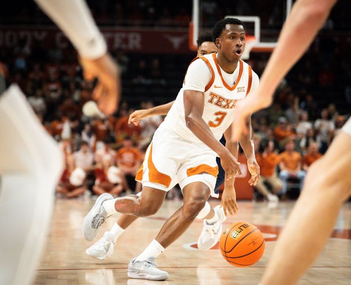 Texas guard Max Abmas (3) brings the ball down the court in the second half of Longhorns' game against the Rice Owls at the Moody Center in Austin, Wednesday, Nov. 15, 2023. Texas won the game 80-64.