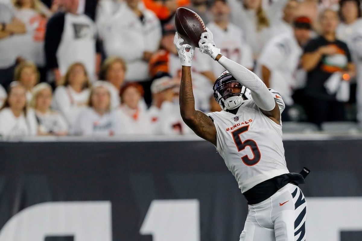 Sep 25, 2023; Cincinnati, Ohio, USA; Cincinnati Bengals wide receiver Tee Higgins (5) catches a pass against the Los Angeles Rams in the first half at Paycor Stadium.