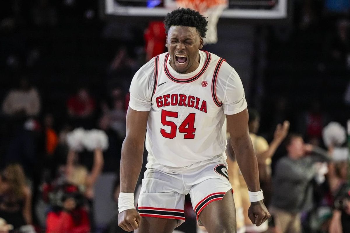 Dec 5, 2023; Athens, Georgia, USA; Georgia Bulldogs center Russel Tchewa (54) reacts after a Georgia basket against the Georgia Tech Yellow Jackets during the second half at Stegeman Coliseum.