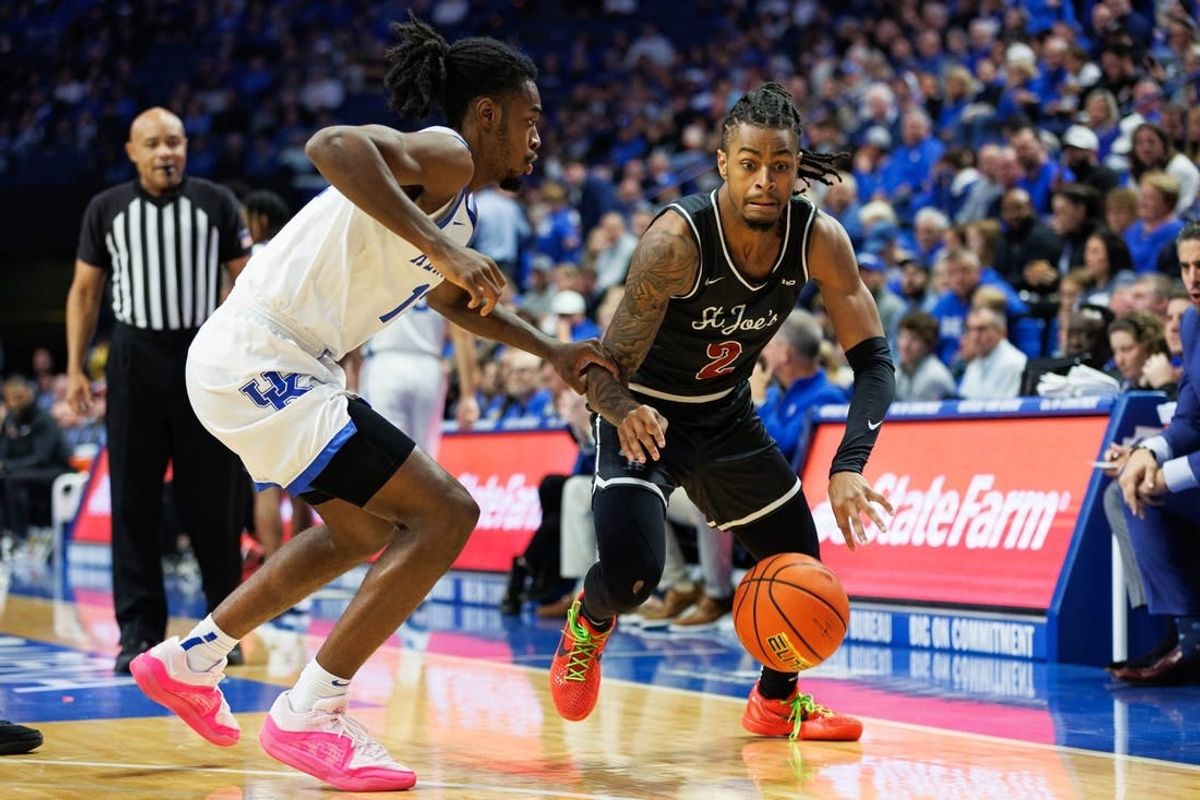 Nov 20, 2023; Lexington, Kentucky, USA; Saint Joseph's Hawks guard Erik Reynolds II (2) drives to the basket during the first half against the Kentucky Wildcats at Rupp Arena at Central Bank Center.